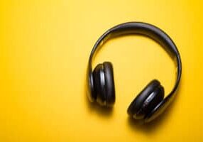 Headphones on a bright yellow background